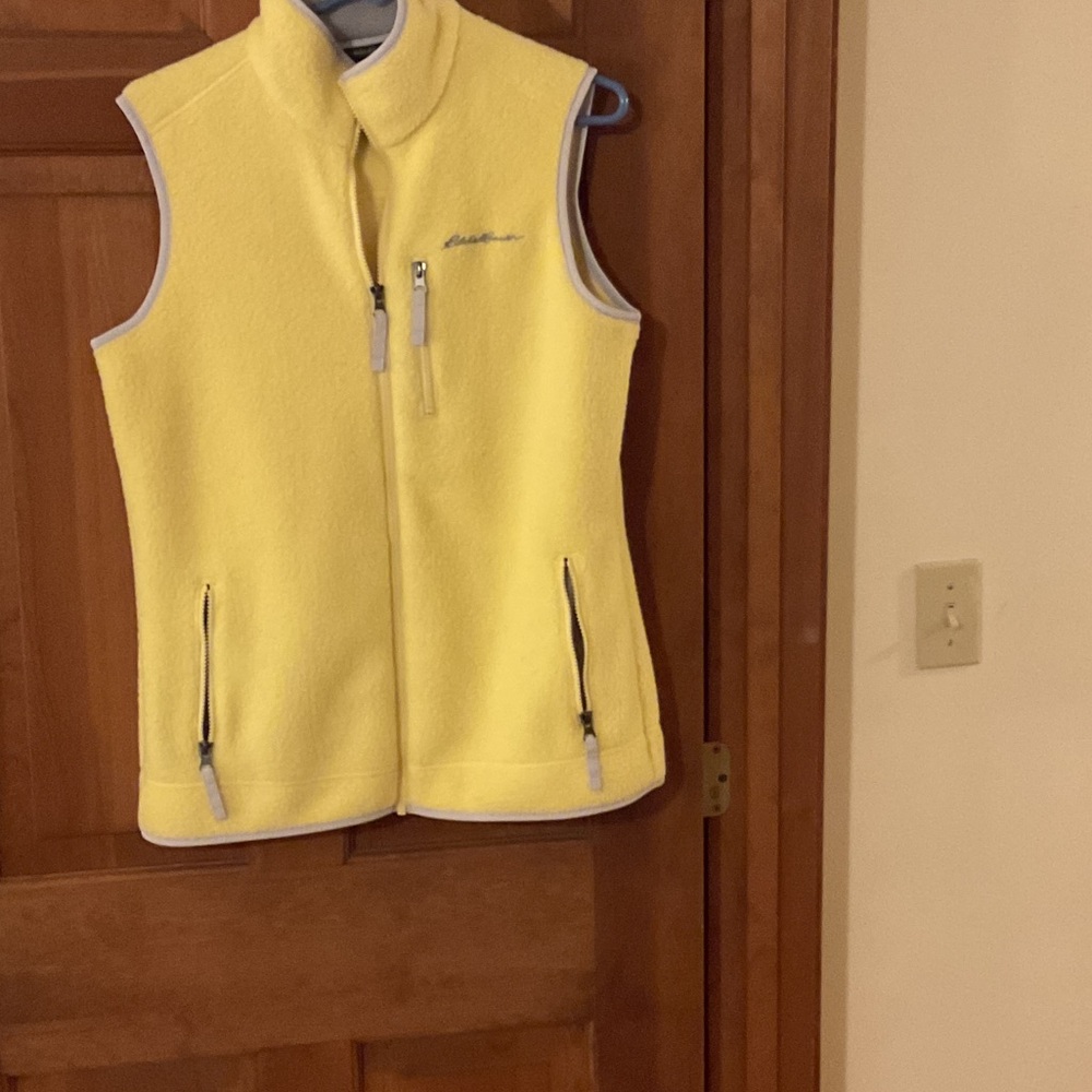 Woman’s Eddie Bauer yellow fleece vest size M